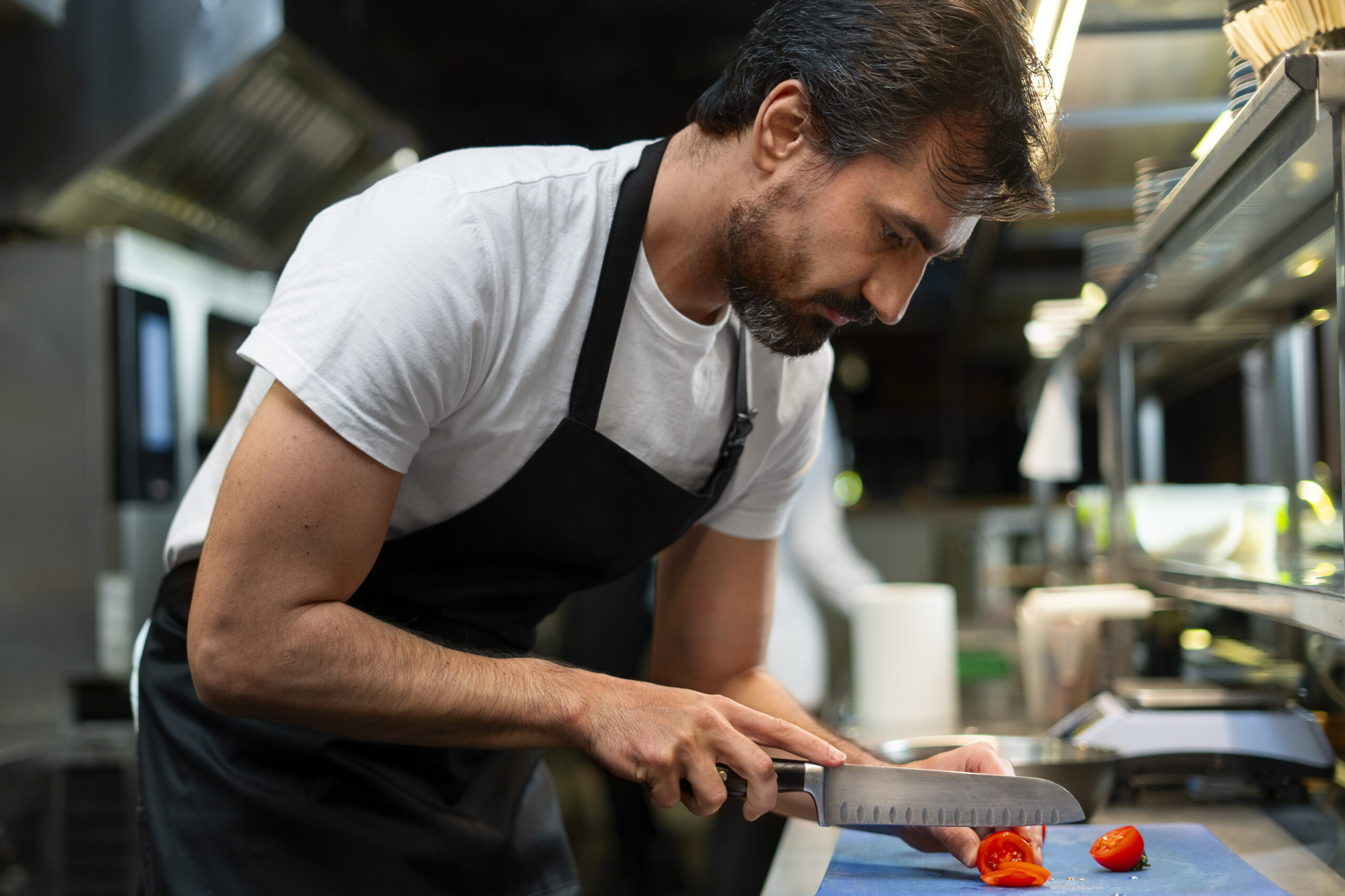 chef cooking kitchen while wearing professional attire (2)