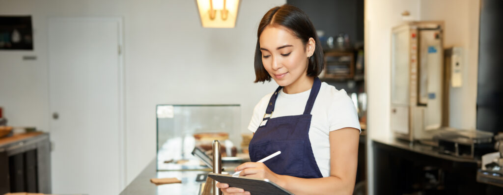 Smiling Cute Barista Girl Korean Woman Working Cafe Using Tablet Process Order Making Coffee 1024x397
